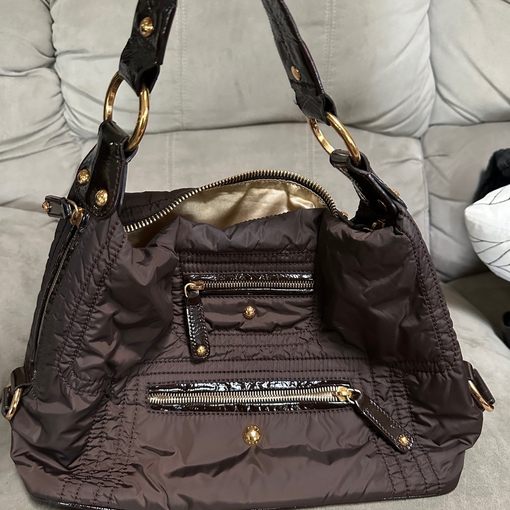 Authentic Tod's Pashmy Dark Brown Shoulder Bag with Gold Accents
